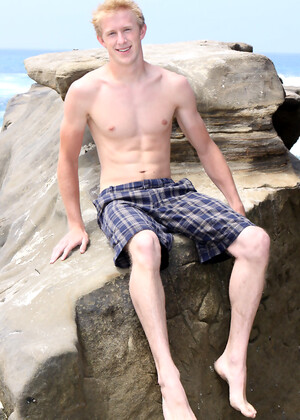 Blond twink Neal jerking off