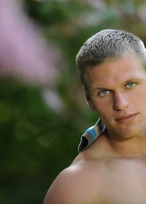 Muscle stud posing naked outdoors