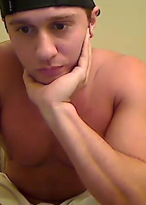 Shirtless Jock Grabs Cock