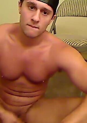 Shirtless Jock Grabs Cock