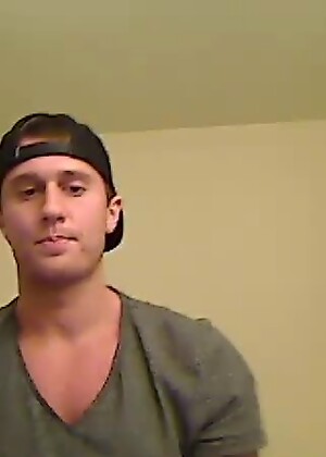 Shirtless Jock Grabs Cock