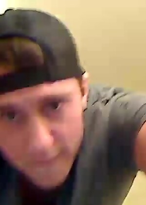Shirtless Jock Grabs Cock