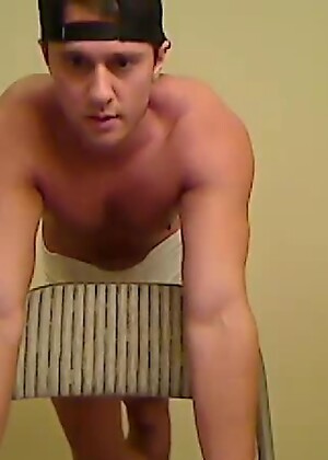 Shirtless Jock Grabs Cock