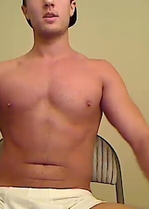 Shirtless Jock Grabs Cock