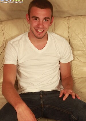 Gorgeous Richard Wolfe masturbates on the sofa.