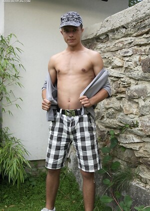 Hard bodied Jody busting a nut outdoors.