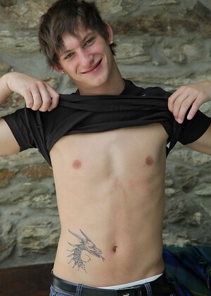 Tattooed boy Myles gets cock at full attention for you!