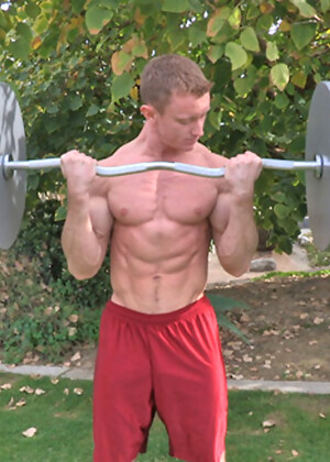 Clark working out and strokes his muscle cock