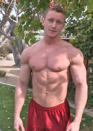 Clark working out and strokes his muscle cock