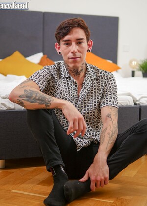 Sexy tatttooed twink Roman Capellini shows his ass