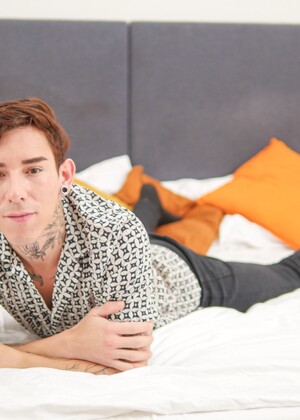 Sexy tatttooed twink Roman Capellini shows his ass