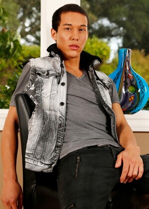 Teenage stallion Ashton Miller shows off his sexy tattooed body and hard dick