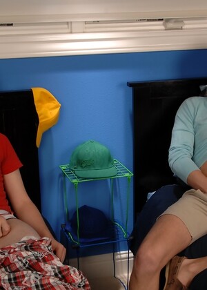 Blonde twink Leon Styles and his buddy Philip Ryan playing with sex toys on the bed