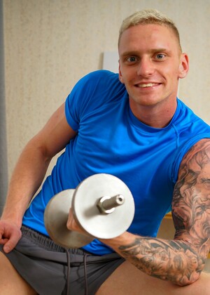 Tattooed uncut athlete Martin Spell jacking off his dick