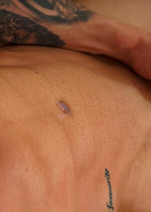 Tattooed uncut athlete Martin Spell jacking off his dick