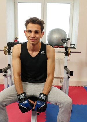 Skinny fighter Lior Hod in a gym