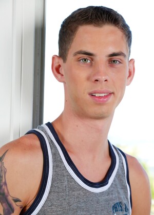 Skinny twink Sam Truitt shows his dick and poses in a solo by Next Door Twink