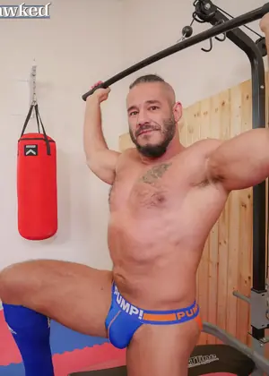 Muscle man Neil Henryk working out by Jawked