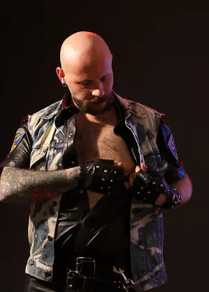 Tattooed Biker Smoking - Mike Chain by Butch Dixon