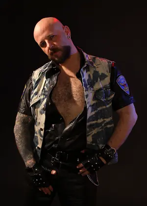 Tattooed Biker Smoking - Mike Chain by Butch Dixon