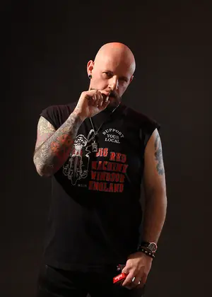 Tattooed Biker Smoking - Mike Chain by Butch Dixon