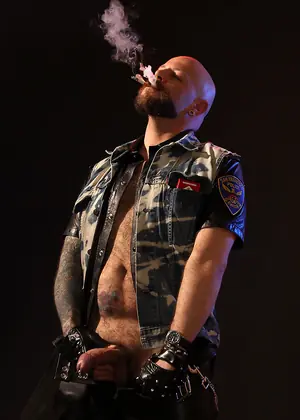 Tattooed Biker Smoking - Mike Chain by Butch Dixon